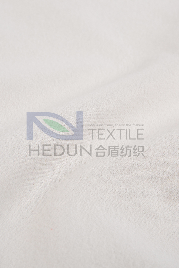 Four-sided elastic fleece cloth