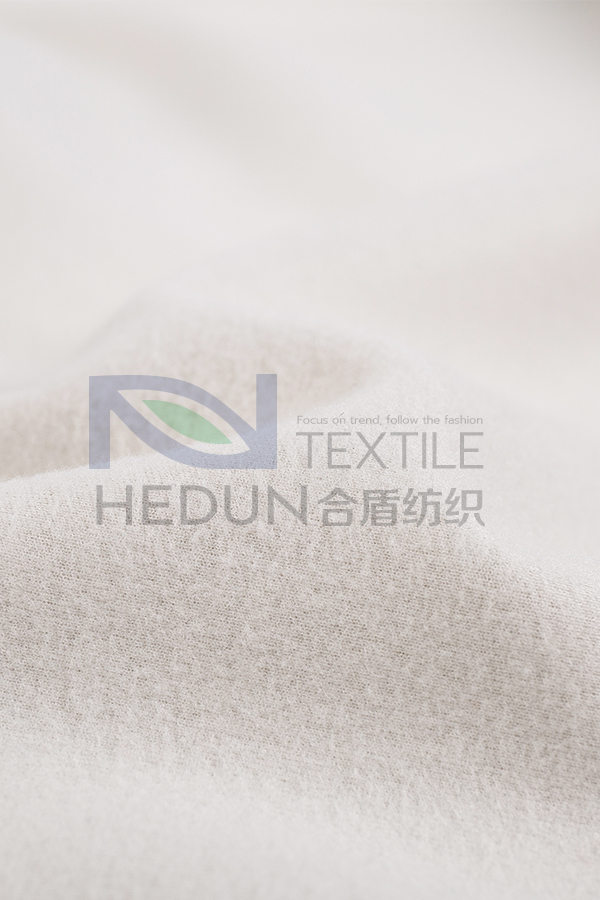 Four-sided elastic fleece cloth