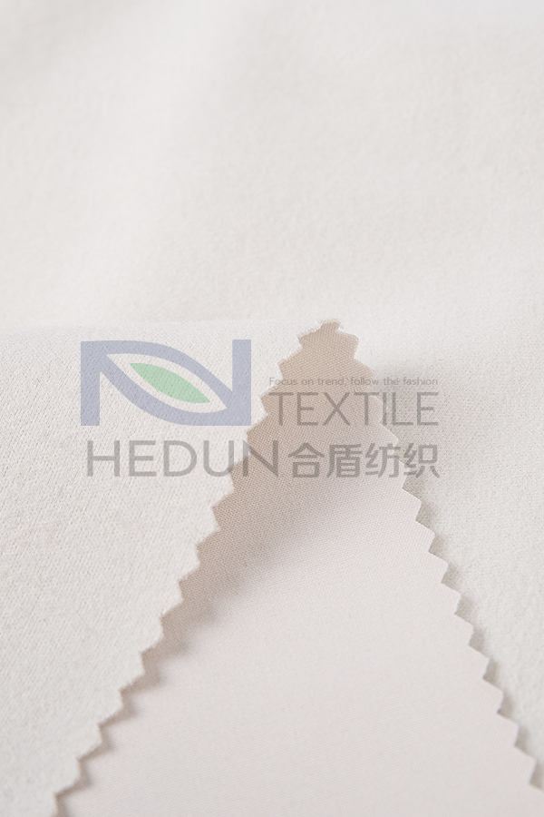 Four-sided elastic fleece cloth