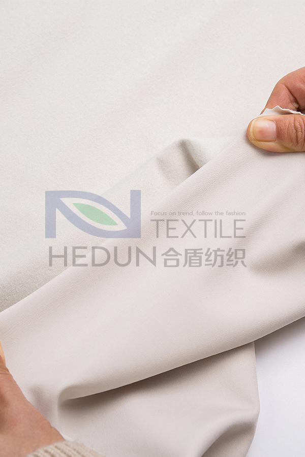 Four-sided elastic fleece cloth